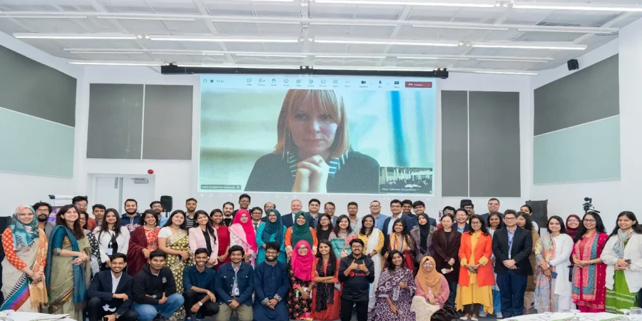 Guests at the research report launch event titled Non-Formal Education for Youth-Led Change: Youth Development Programming in Bangladesh.